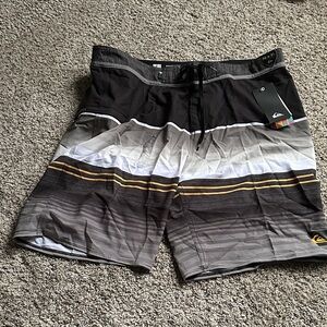 Quiksilver Men's Black, Gray & White Striped Boardshorts with Gold Accents